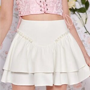 Elegant White Layered Skirt with Pearl Details